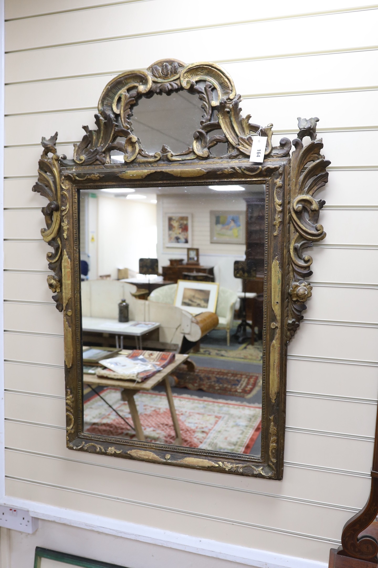 An 18th century Italian giltwood mirror, width 90cm, height 115cm